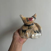 Load image into Gallery viewer, A work in progress of a fun cat created during indoor activities pottery class for kids in Montreal.
