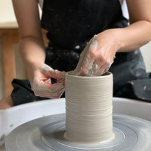 Load image into Gallery viewer, A pottery class at a Montreal Canada bachelorette party, crafting unique clay pieces for a fun and memorable celebration.
