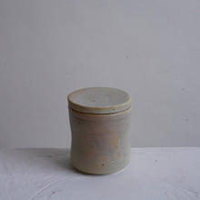 Load image into Gallery viewer, small handmade container with green and pink hue
