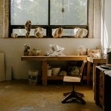 Load image into Gallery viewer, Enjoying a hand-building pottery class during a Montreal Canada bachelorette party, creating unique clay pieces for a creative celebration.
